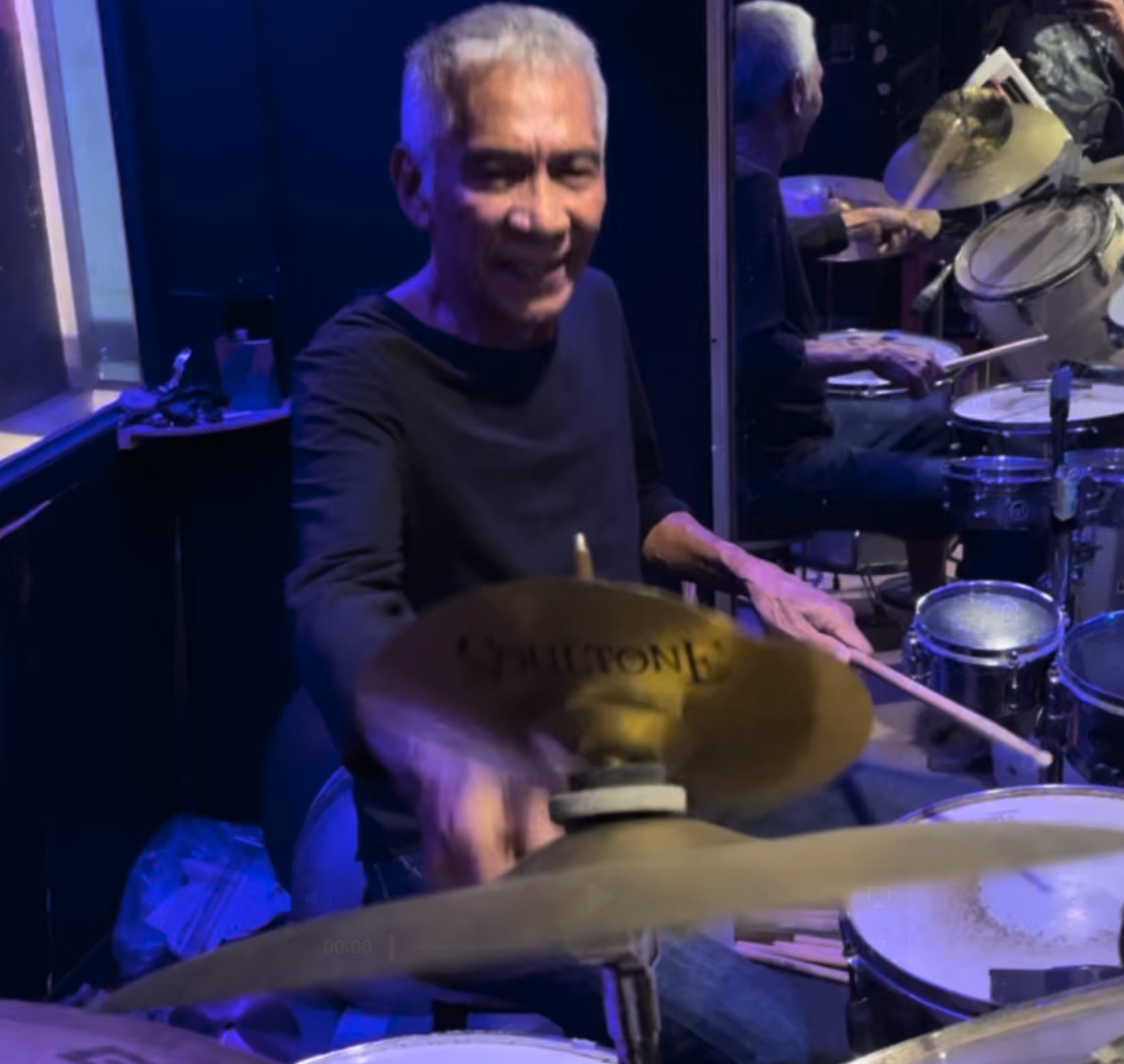 Cesar 'Bachu' Yumping playing drums